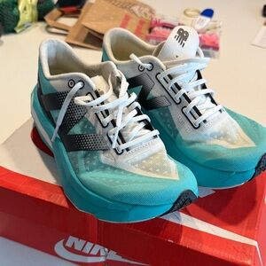 New balance Turquoise and White Sneakers energy arc